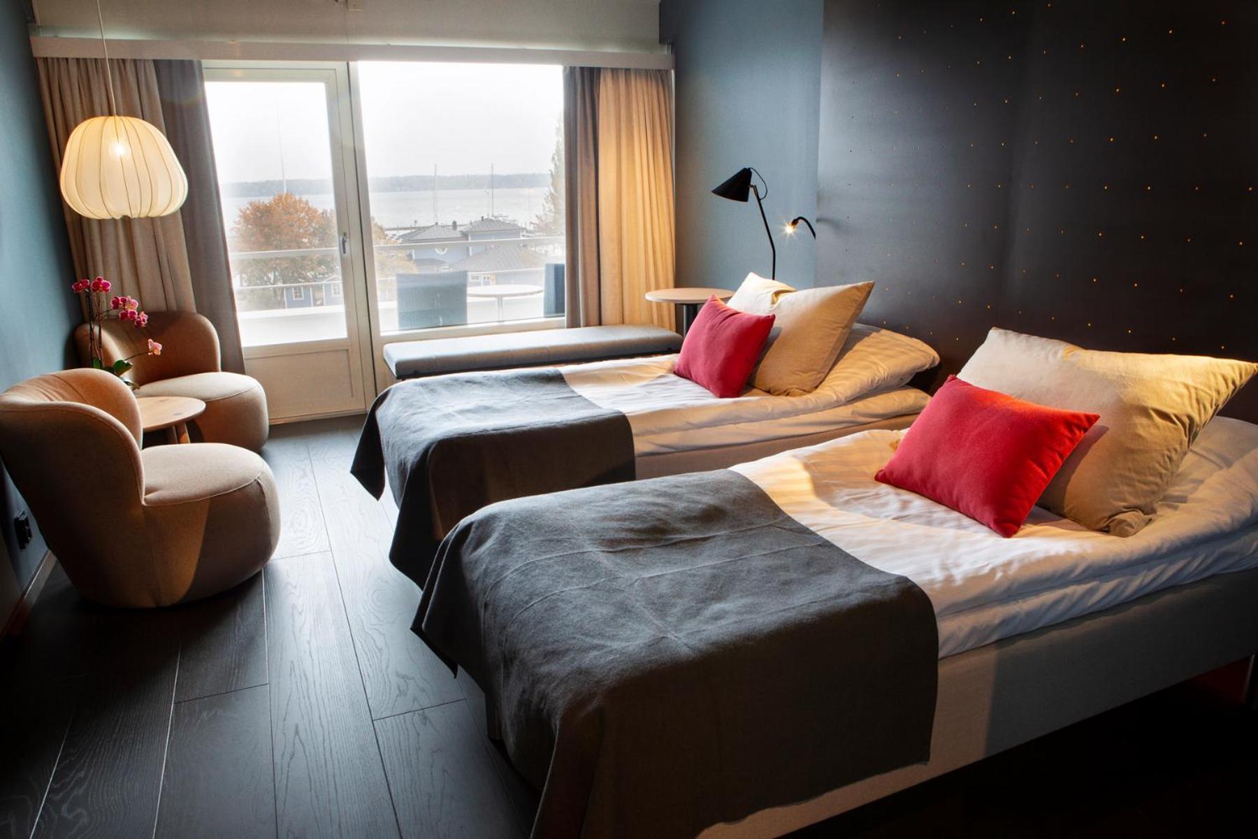 Tvåbäddsrum med havsutsikt